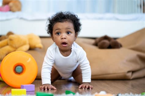 Premium Photo Happy African American Little Baby Boy Crawling And