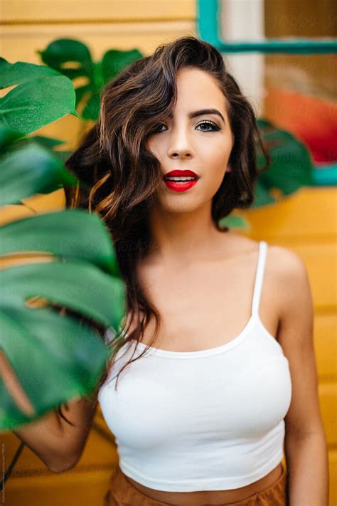 Vertical Portrait Of A Beautiful Hispanic Female Model By Stocksy