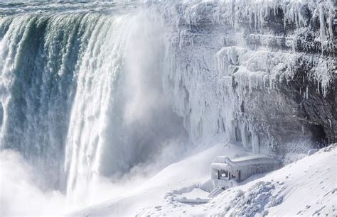 See The Incredible Photos Of Niagara Falls Frozen Over As A Result Of