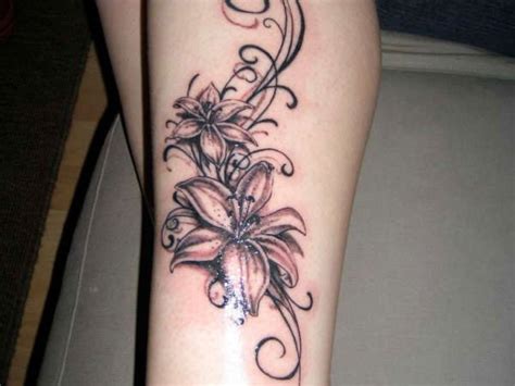 50 Elegant Flowers Tattoos On Leg
