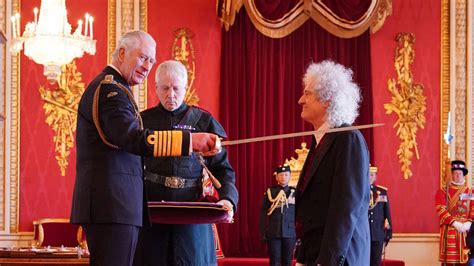 Queen Legend Sir Brian May Is Knighted By King Charles Iii At