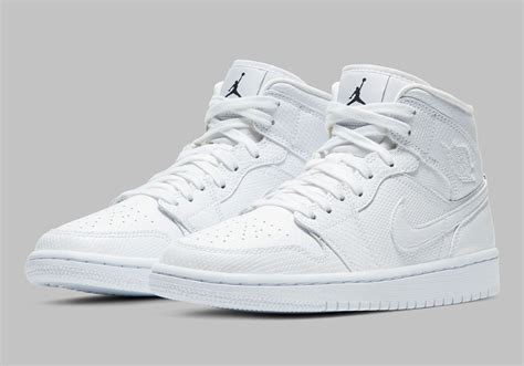 The Air Jordan 1 Mid Appears In A Lux White Snakeskin White Jordan