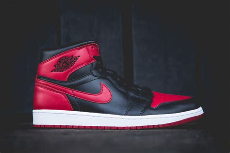It was designed by peter moore in 1985 and banned from the nba for breaking uniform regulations. Air Jordan 1 Retro "Bred" Preview | HYPEBEAST