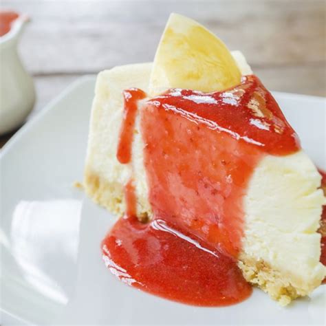 The Classic Cheesecake Goes Well With A Homemade Strawberry Sauce