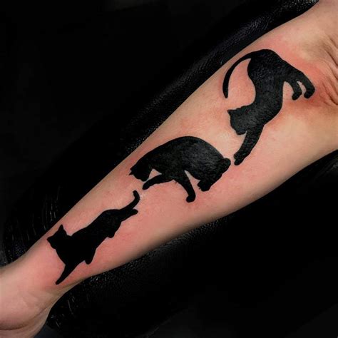 Black Cat Silhouette Tattoo
