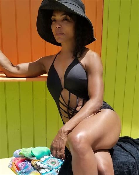 Angela Bassett Shows Off Her Toned Body In Black One Piece