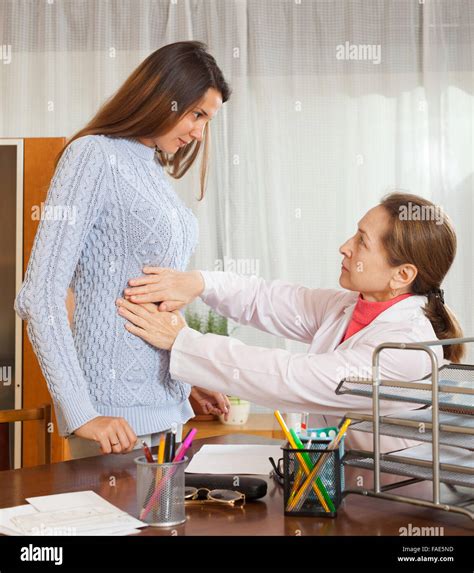 Doctor Examining Stomach Girl Hi Res Stock Photography And Images Alamy