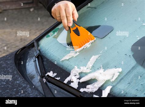 Hand Scraping Ice Off Windshield Stock Photo Alamy