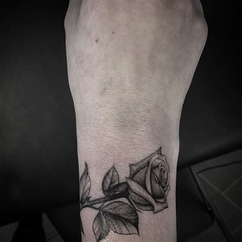 Check out these 67 arranging wave tattoo design ideas: Small rose. Wraps around the wrist #blxckink #btattooing # ...