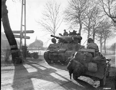 A 9th Armored Division M4 Sherman Tank Moves Up In Attempt To Stem The