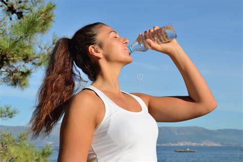 Young Woman Drinking Water After Exercising Stock Image Image Of