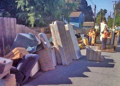 Habitat elite memory foam mattress. County workers remove a mattress from the alley behind the ...
