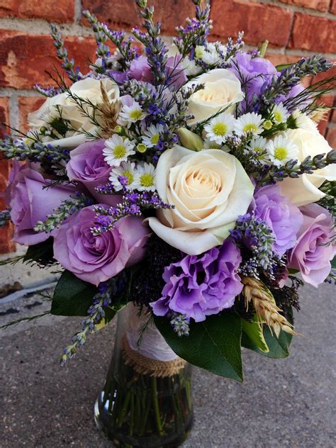 This Beautiful Garden Bridal Bouquet Has A Mix Of Lavender And Ivory