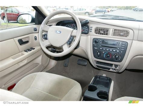 2006 Ford Taurus Se Mediumdark Pebble Beige Dashboard Photo 38621853