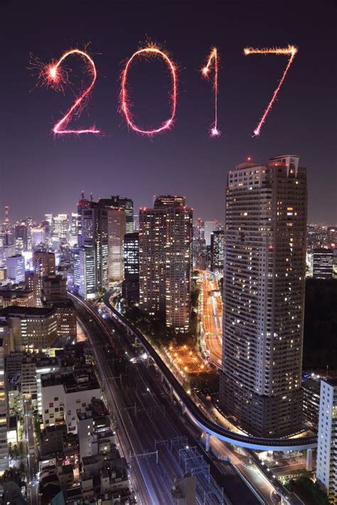 2017 Happy New Year Fireworks Over Tokyo Cityscape At Night Stock