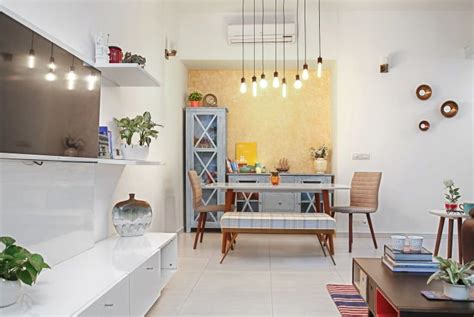 Living room design ideas from mumbai homes. Compact 2BHK That Embodies the Spirit of Mumbai | Minimalist living room, Flat interior design ...