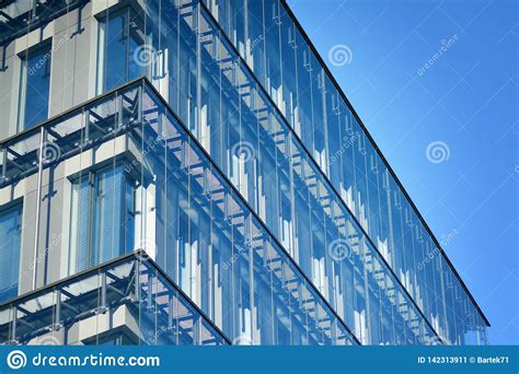 Modern Office Building Facade Abstract Fragment Shiny Windows In Steel