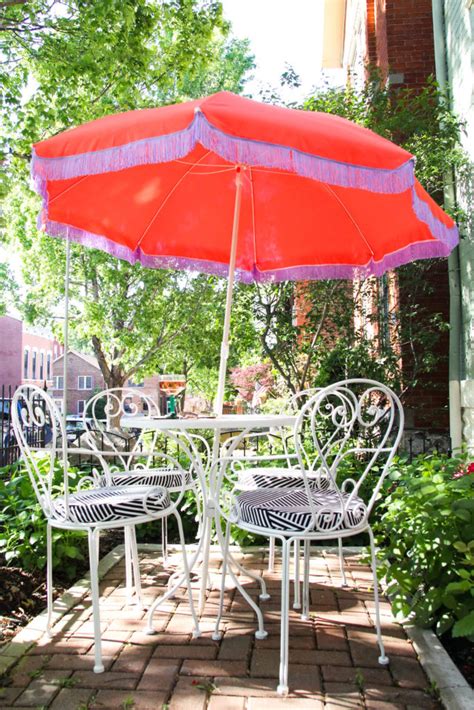 I got this umbrella at lowes a long time ago and it is in decent shape otherwise. DIY MID CENTURY PATIO UMBRELLA - Queens Vein
