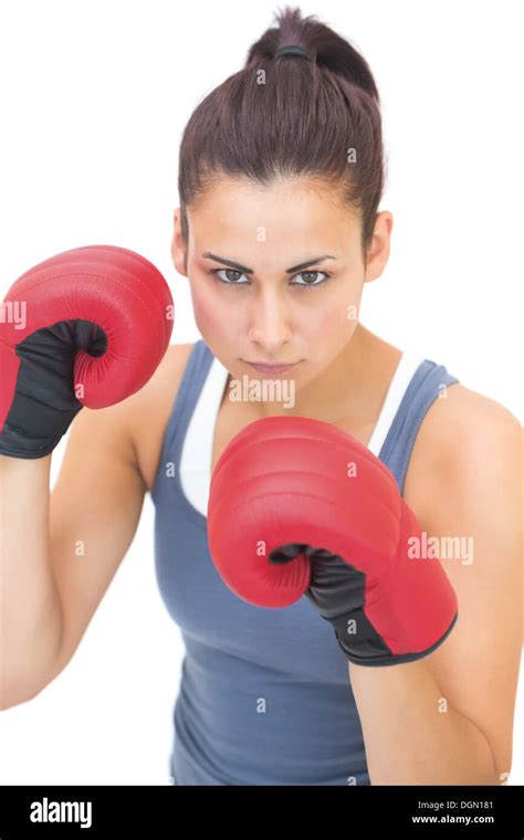 Stern Sporty Brunette Wearing Red Boxing Gloves Stock Photo Alamy