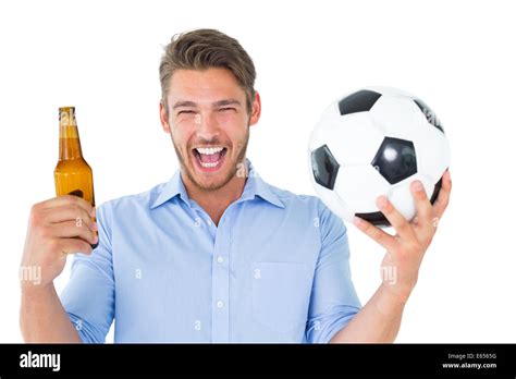 Handsome Young Man Holding Ball And Beer Stock Photo Alamy