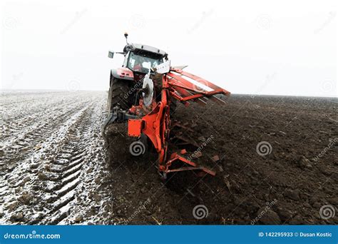 Tractor Plowing A Field Stock Image Image Of Cultivated 142295933