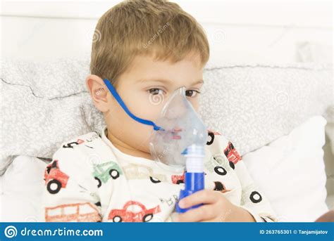 Sick Boy With An Inhaler Stock Image Image Of Inhalation 263765301