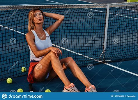 Beautiful Woman Is Resting At Tennis Court Stock Image Image Of Blond