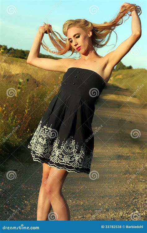 Pretty Blond Walks Down Path Stock Photo Image Of Glamour Glamor