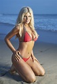 Baywatch hottie Donna D'Errico showcases major cleavage in eye-watering ...
