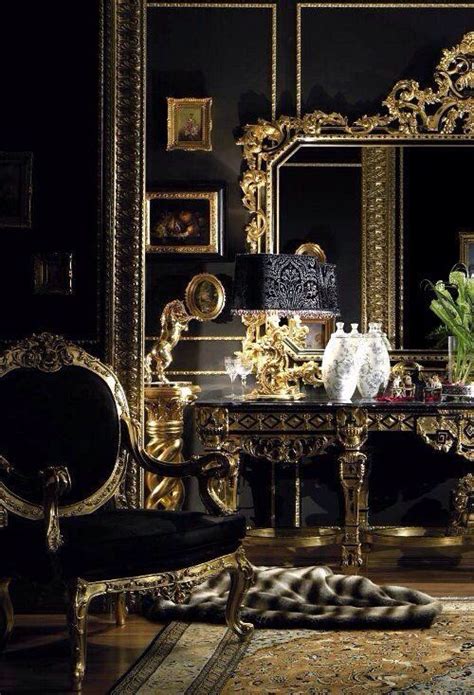 An Ornately Decorated Room With Black Walls And Gold Trimmings On The