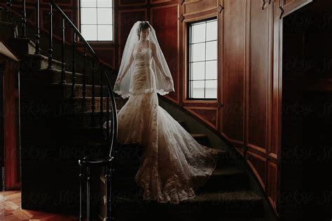 Moody Portrait Of Bride On Starewell By Stocksy Contributor Sidney