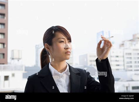 Young Woman Smoking Stock Photo Alamy