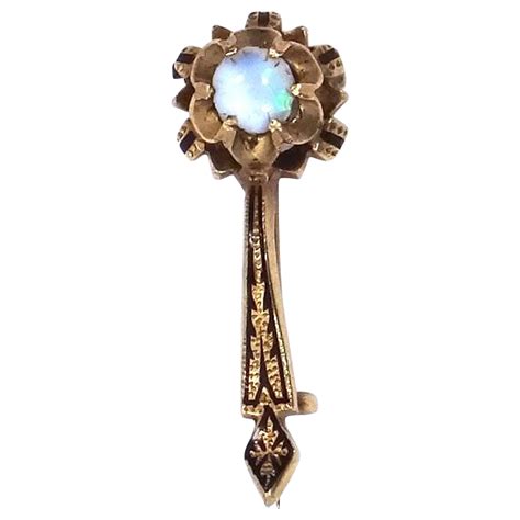 Halley's comet is arguably the most famous comet. Mid 1800's 14k yellow gold, black enamel and opal Halley's ...