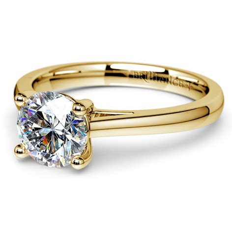 Petite Round Moissanite Engagement Ring In Yellow Gold 6 Mm