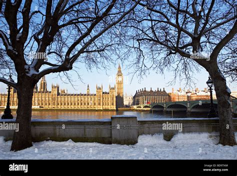 Snow On Ground In Front Of Houses Of Parliament And Big Ben London