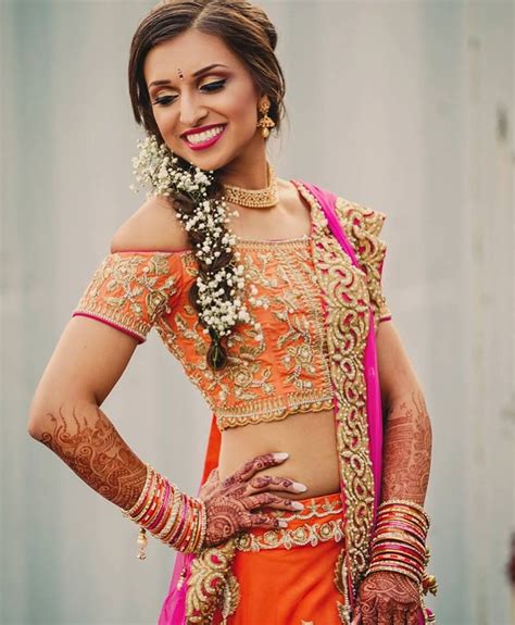beautiful gujarati bride in usa at her sangeet makeup hair by travelling makeup artist