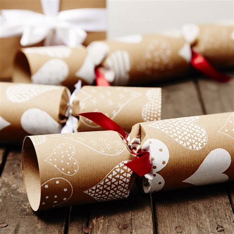 They make great gifts and table decorations. white heart brown christmas crackers by sophia victoria joy | notonthehighstreet.com