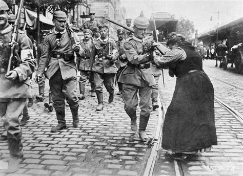 A Woman Gives Flowers To A German Soldier Leaving For The Front Berlin