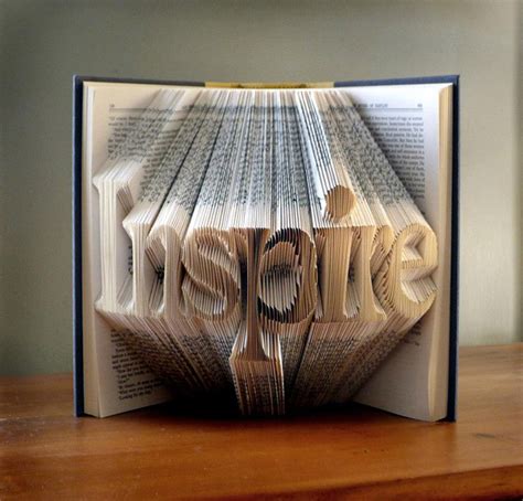 Brilliant Sculptures On Folded Book Art By Luciana Frigerio