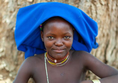 Mucubal Tribe Young Woman Wearing A Blue Headwear Namibe Province Virei Angola A Photo On