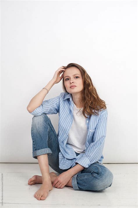 Young Woman Sitting On A Floor By Stocksy Contributor Amor Burakova Stocksy