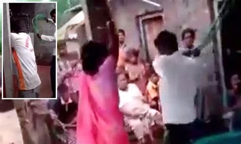 indian husband shown tying up his cheating wife and her lover before beating them daily mail