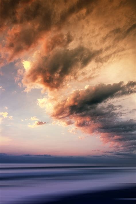 Calm Sea Under Cloudy Sky At Daytime Photo Free Cloud Image On Unsplash