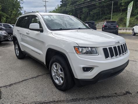 Pre Owned 2014 Jeep Grand Cherokee Laredo In Bright White Clearcoat