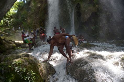 Pilgrims Sing And Dance In Magic Waterfall Where They Beg Goddess Of