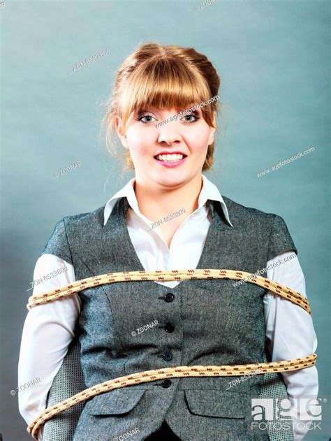 Kidnapped Woman Tied With Rope To Chair Stock Photo Picture And