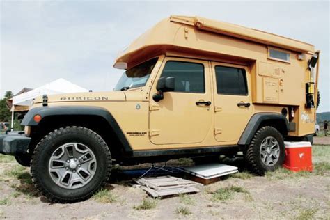 Camp in style and comfort with adventure trailers' even so, it can support 600 lbs of tools and people on its shell, with its roof strut supporting another 100. jk wrangler camper - Google Search | Slide in truck campers, Jeep wrangler camper