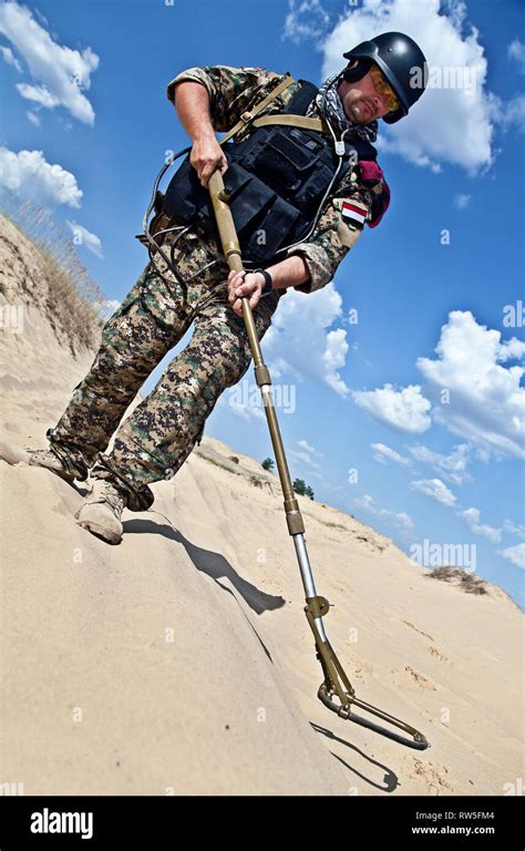 Iraqi Soldier In The Desert With Army Metal Detector Stock Photo Alamy