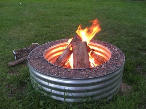 Large metal ring for fire pit. 15 DIY Fire Pit Ideas | DIY Formula