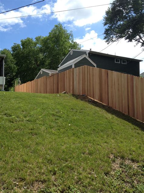 cedar fence sloped back yard panels built in place on a slope backyard fences fence